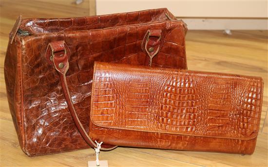 A 1930s crocodile handbag plus a simulated crocodile clutch